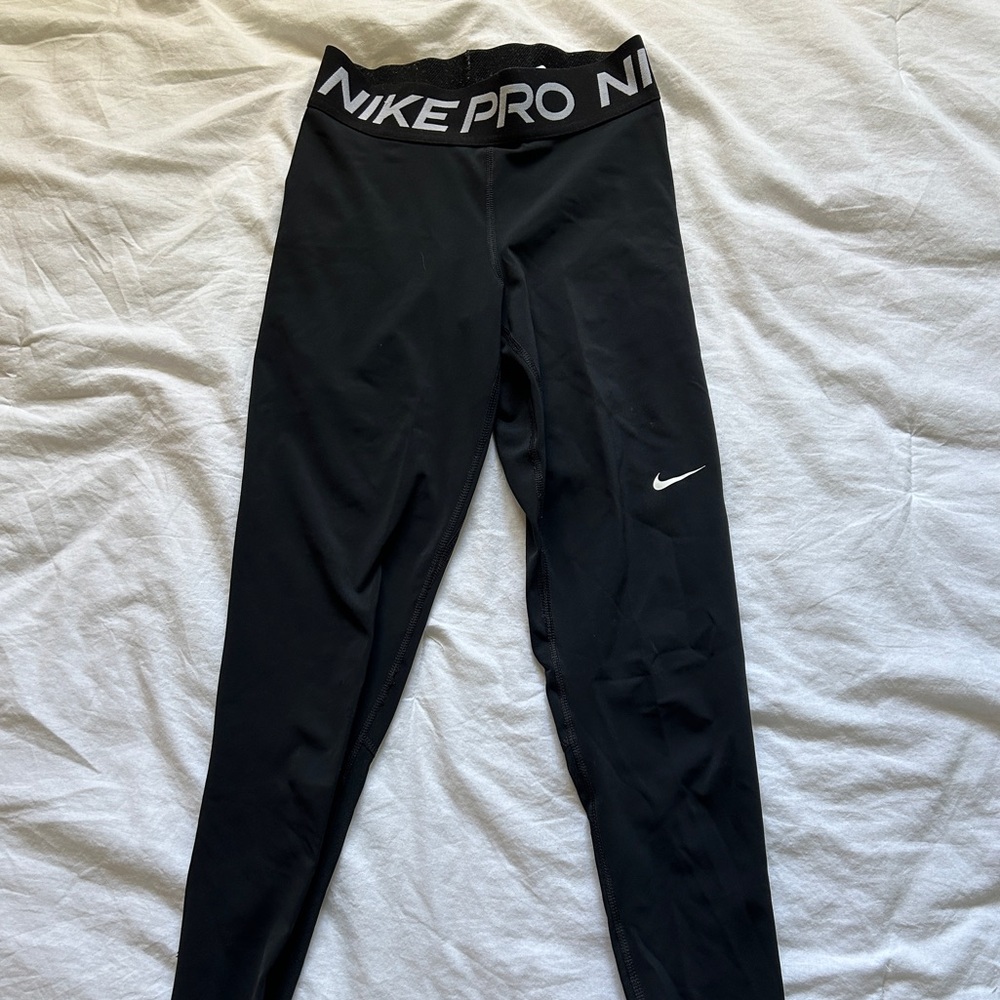 Nike pro women leggings with mesh on bottom
